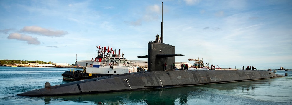 The Ohio-class ballistic missile submarine USS Louisiana (SSBN 743) departs U.S. Naval Base Guam following a scheduled port visit.