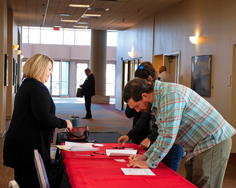 Glenda Kohlieber, contract specialist in the Albuquerque District’s Contracting Execution Branch, registers a participant attending the district’s Business Opportunities Open House at the Albuquerque Convention Center, March 21, 2024.