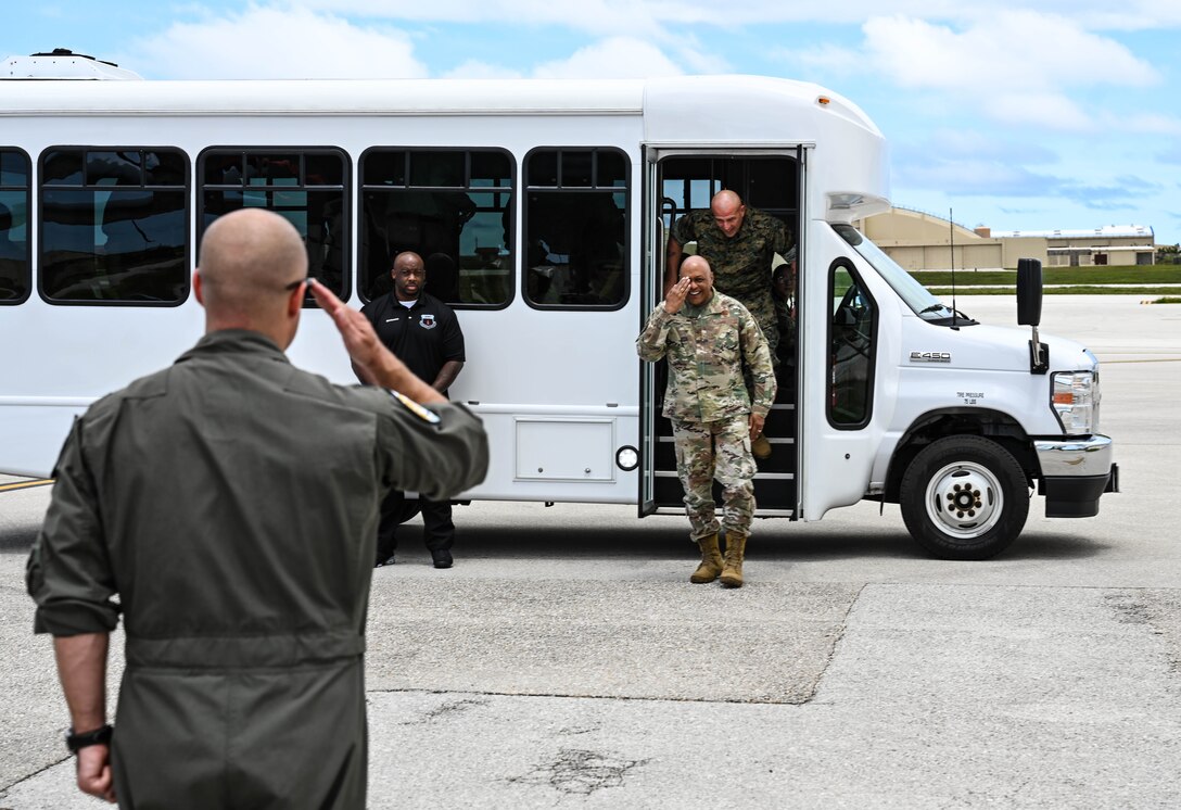 Gen. Anthony Cotton, commander, U.S. Strategic Command, returns a salute to Lt. Col. Christian Hoover, left, 37th Expeditionary Bomb Squadron commander, at Andersen Air Force Base, Guam, June 3, 2024, during a base tour. As part of his visit, Cotton took the opportunity to interact and recognize Airmen within the 37th EBS as they conduct Bomber Task Force 24-6 missions. BTF missions enable crews to maintain a high state of readiness and proficiency and validate our always-ready global strike capability. (U.S. Air Force photo by Airman 1st Class Dylan Maher)