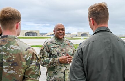 Gen. Anthony Cotton, commander, U.S. Strategic Command, speaks with Capt. Marc Makens, right, 37th Expeditionary Bomb Squadron combat mission ready weapon systems officer at Andersen Air Force Base, Guam, June 3, 2024, during a base tour. As part of his visit, Cotton took the opportunity to interact and recognize Airmen within the 37th EBS as they conduct Bomber Task Force 24-6 missions. BTF missions enable crews to maintain a high state of readiness and proficiency and validate our always-ready global strike capability. (U.S. Air Force photo by Airman 1st Class Dylan Maher)