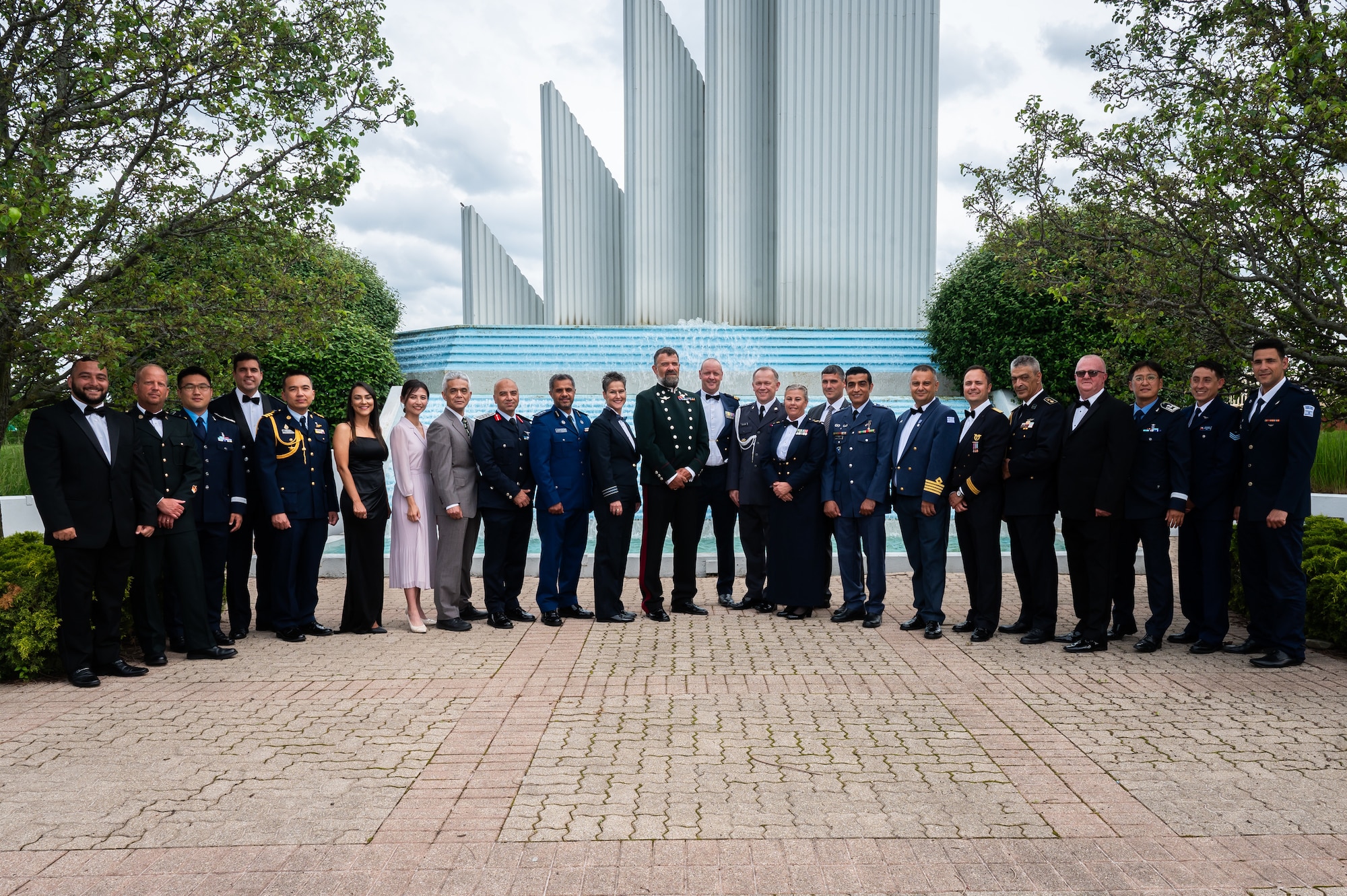 A group of people gather for a photo during the AFSAC/FLO International reception
