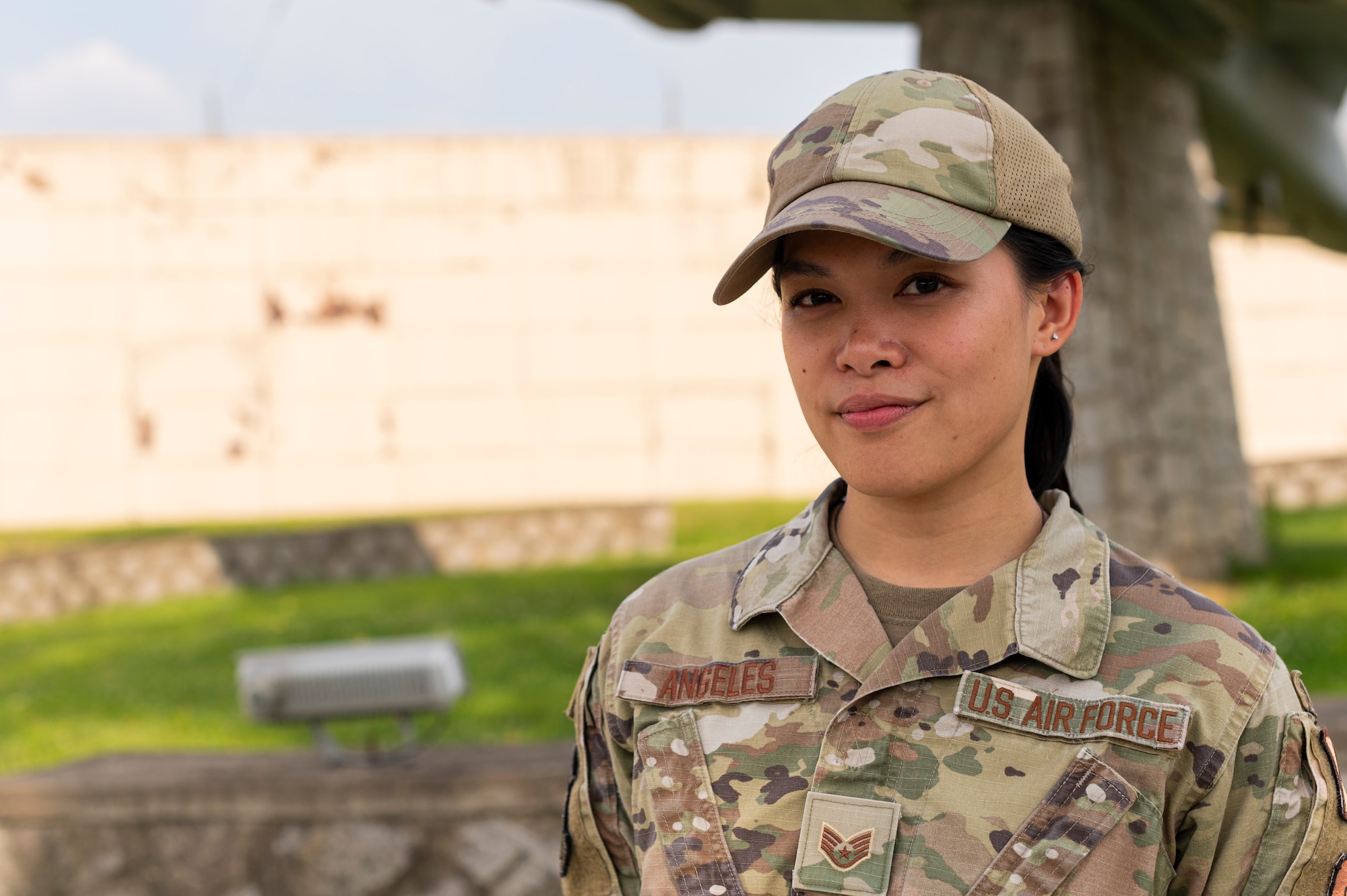 U.S. Air Force Staff Sgt. Joy Angeles, 51st Comptroller Squadron financial analyst, poses for a photo at Osan Air Base, Republic of Korea, June 5, 2024. Angeles earned the title of Mustang of the Week for her dedication to the unit and the 51st Fighter Wing mission.  Angles contributes to the 51st FW by directing accounting programs, conducting audits, and resolving and realigning $112,000 towards critical mission requirements. (U.S. Air Force photo by Senior Airman Kaitlin Frazier)