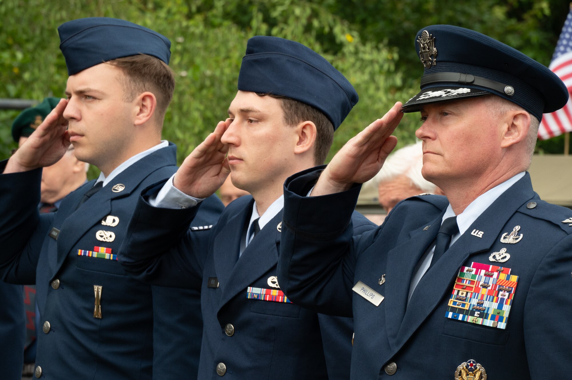 Pathfinders salute during a D-Day ceremony.