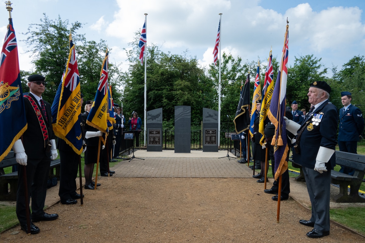 Participants stand in formation.