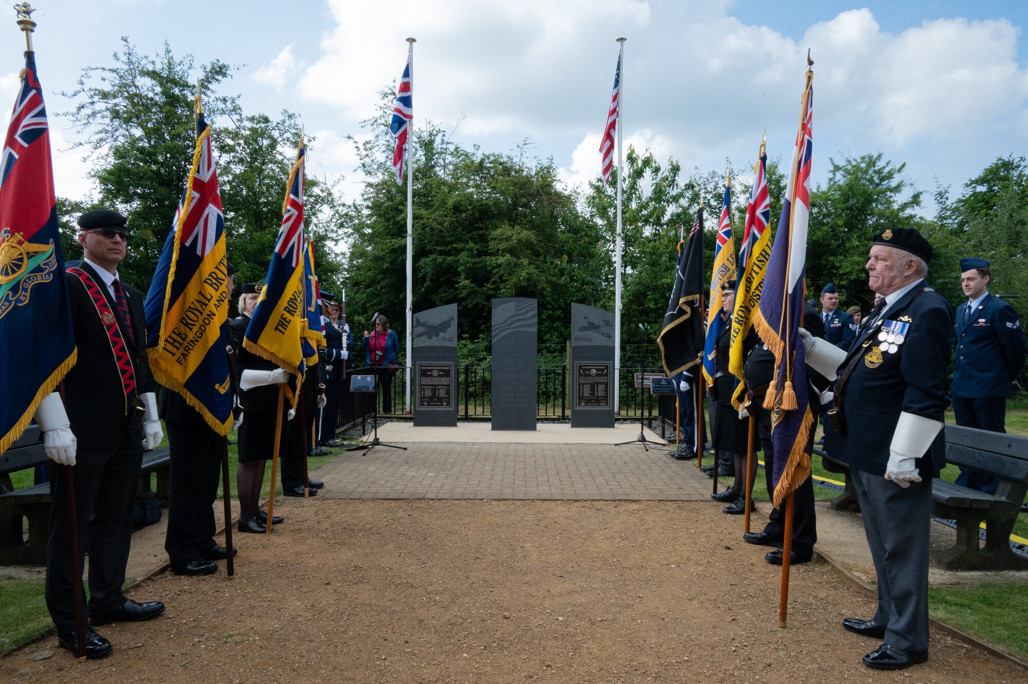Participants stand in formation.