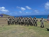 Airmen from the 173rd Security Forces Squadron from Kingsley Field, Oregon, pose for a group photo during their annual training exercise May 4, 2024, at Marine Corps Air Station at Kaneohe Bay in Oahu, Hawai'i.