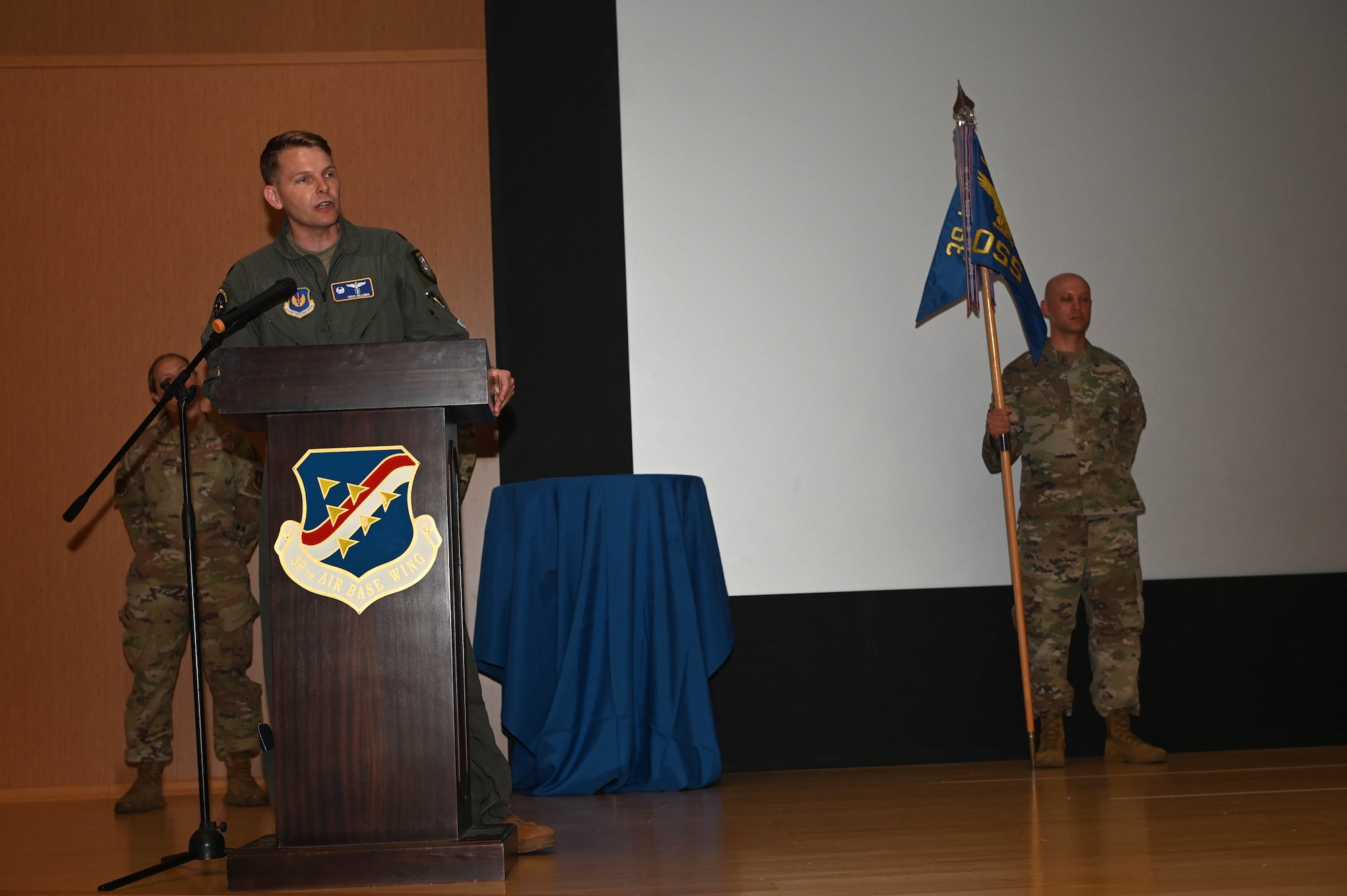 U.S. Air Force Lt. Col. Travis Halleman, 39th Operations Support Squadron commander, gives a speech during a change of command ceremony at Incirlik Air Base, Türkiye, June 7, 2024. The 39th OSS provides air traffic control, weather services, intelligence support, airfield management, and airfield systems maintenance in support of U.S., Turkish, and NATO operations. (U.S. Air Force photo by Staff Sgt Alexandria Lee)