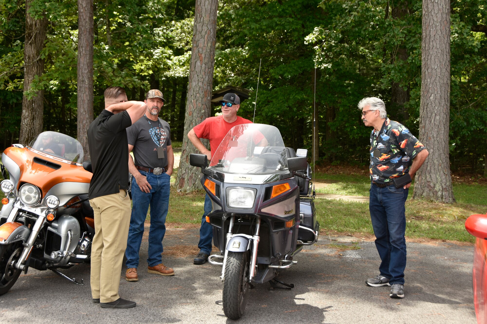 Arnold Air Force Base team members gather to chat around a motorcycle on display during the 2024 CGOC Auto Show & Burger Burn at Arnold AFB, Tenn., May 31, 2024. The event, hosted by the Arnold AFB Company Grade Officers’ Council, was held to raise money for the Arnold AFB Air Force Ball to be held later this year. (U.S. Air Force photo by Bradley Hicks) (This image was altered by obscuring badges for security purposes)

Disclaimer: The CGOC is a private organization which is not part of the Department of Defense or any of its components and has no governmental status.