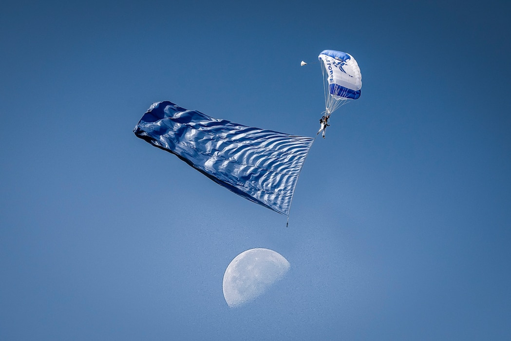 The Wings of Blue, the U.S. Air Force Academy's cadet parachute team, prepares to approach Steelman Field
