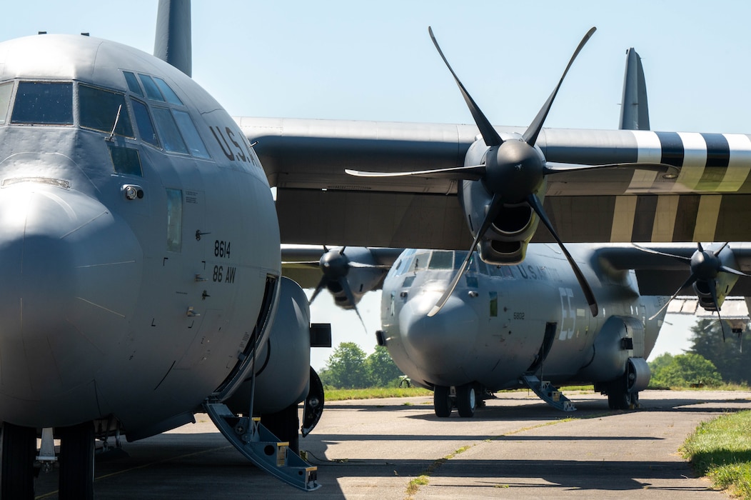 Two U.S. Air Force C130-J Super Hercules are prepared for flyovers