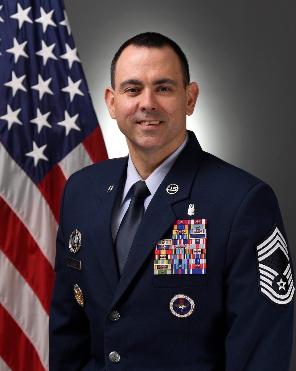 This is the official portrait of Chief Master Sergeant James M. Woods.