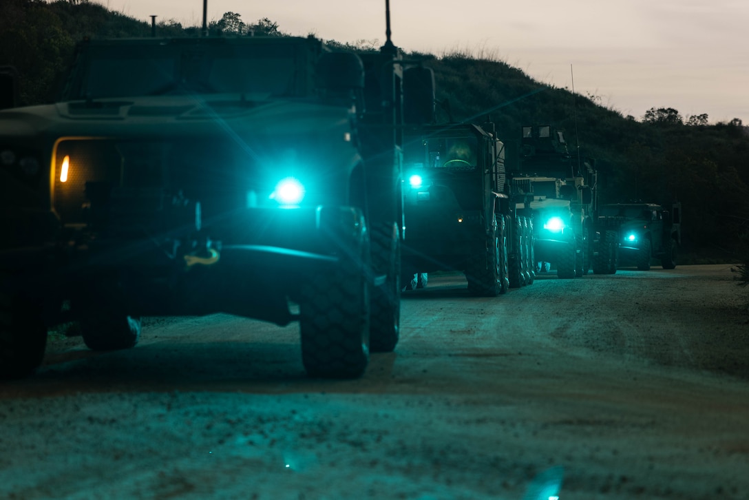 U.S. Marines with 7th Engineer Support Battalion, 1st Marine Logistics Group, stage tactical vehicles before blackout motor transport operations on Camp Pendleton, California Feb. 26, 2024. The blackout motor transport operations provided realistic, relevant training necessary for an effective Marine Corps fighting force.