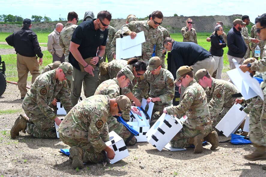 Team Minot Airmen from the 5th Civil Engineer Squadron Explosive Ordnance Disposal flight assemble gel blocks during Hydra Fury 24 at Minot Air Force Base, North Dakota, June 4, 2024. The Airmen used water to create the gel blocks and foam walls to stack them. The dense gel is used to counter a radiological device.