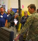 U.S. Air Force Staff Sgt. Spencer Odegard, 5th Civil Engineer Squadron Explosive Ordnance Disposal (EOD) technician, delivers a brief on EOD equipment during a technical exchange at Minot Air Force Base, North Dakota, June 4, 2024. The technical exchange was part of Hydra Fury 24, an exercise consisting of multiple agencies across the Departments of Defense, Energy and Justice.