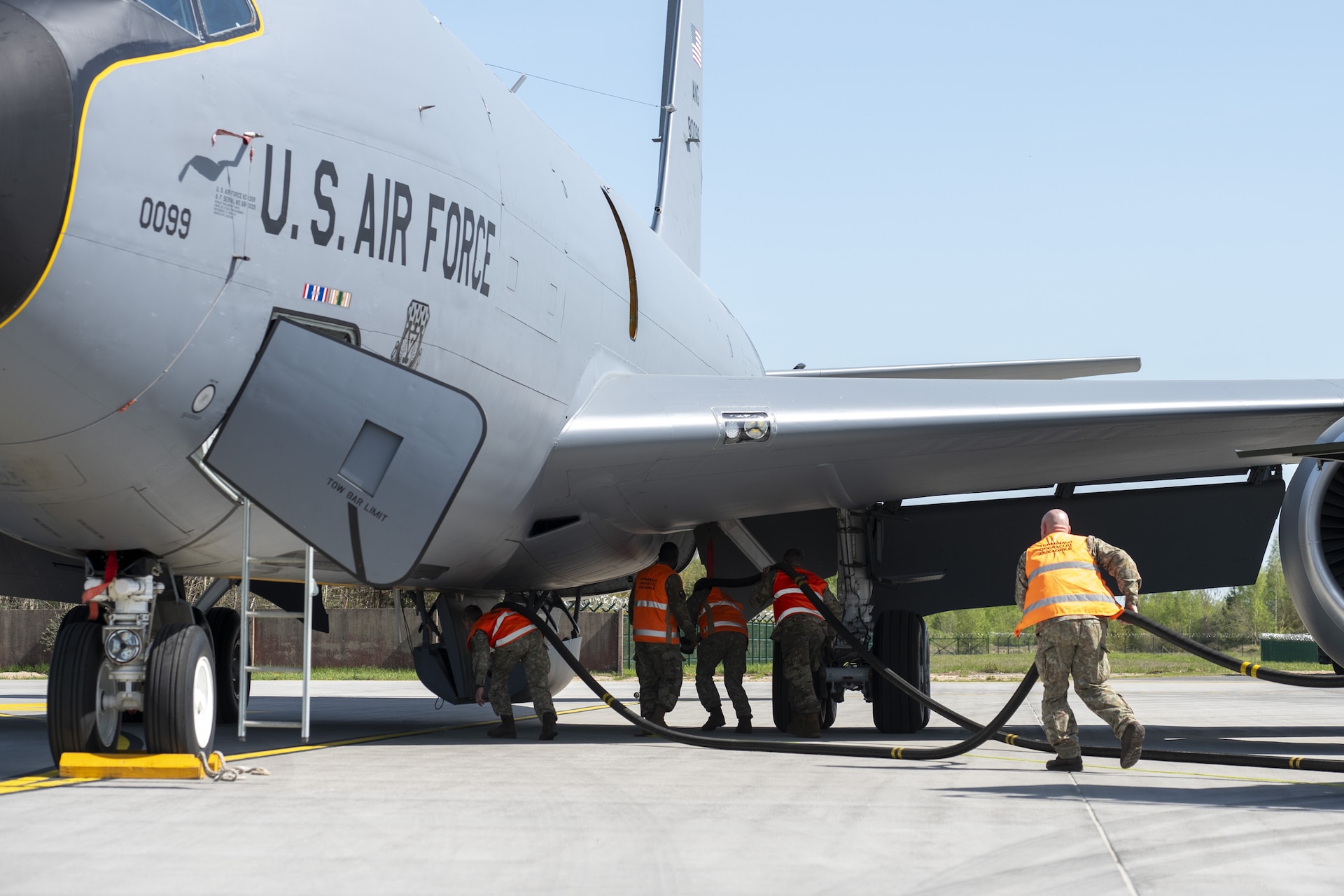 Two members from the 171st Air Refueling Wing, Pennsylvania Air National Guard, share best practices about hot pit refueling on a KC-135 Stratotanker aircraft with the Lithuanian Air Force during the most recent State Partnership Program engagement May 2, 2024, in Siauliai, Lithuania. Pennsylvania and Lithuania have been partner states for over 30 years. (U.S. Air National Guard photo by Tech. Sgt. Zoe M. Wockenfuss)