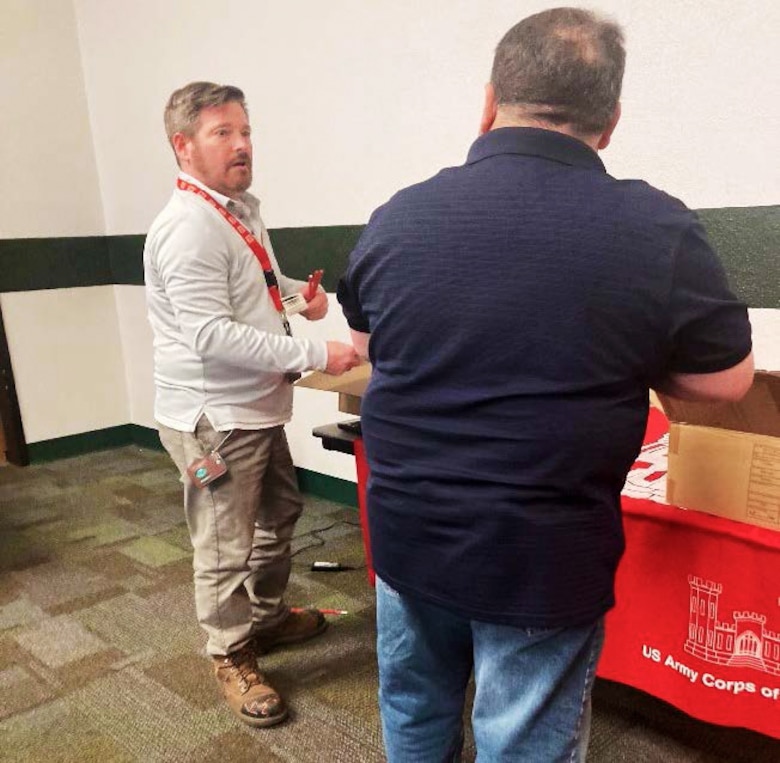 Keith Winemiller, left, environmental engineer in the district's Environmental Engineering Section and Gary Cordova, operations manager at Santa Rosa Lake, prepare for their briefing to students at Eastern New Mexico University in Portales, N.M., during National Engineer Week 2024.