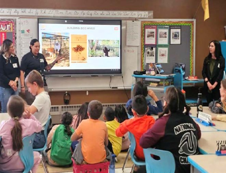USACE-Albuquerque District members answer group questions from kindergarteners at Tombaugh Elementary School in Las Cruces, N.M., during National Engineer Week 2024.