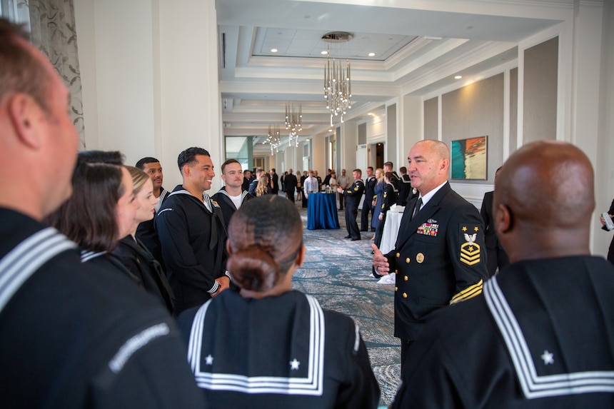 NORFOLK, Va. (June 6, 2024) Fleet Master Chief John Perryman, Fleet Master Chief, U.S. Fleet Forces Command (USFFC), speaks with Sailors of the year from various commands under the purview of USFFC during the 2024 Sailor of the Year announcement dinner, June 6th, 2024. The dinner is the culmination of a weeklong series of events that concludes with the announcement of the 2023 sea and shore Sailors of the Year. Sea and Shore Sailors of the Year will be meritoriously advanced to chief petty officer. (U.S. Navy photo by Mass Communication Specialist 1st Class Evan Thompson/Released)