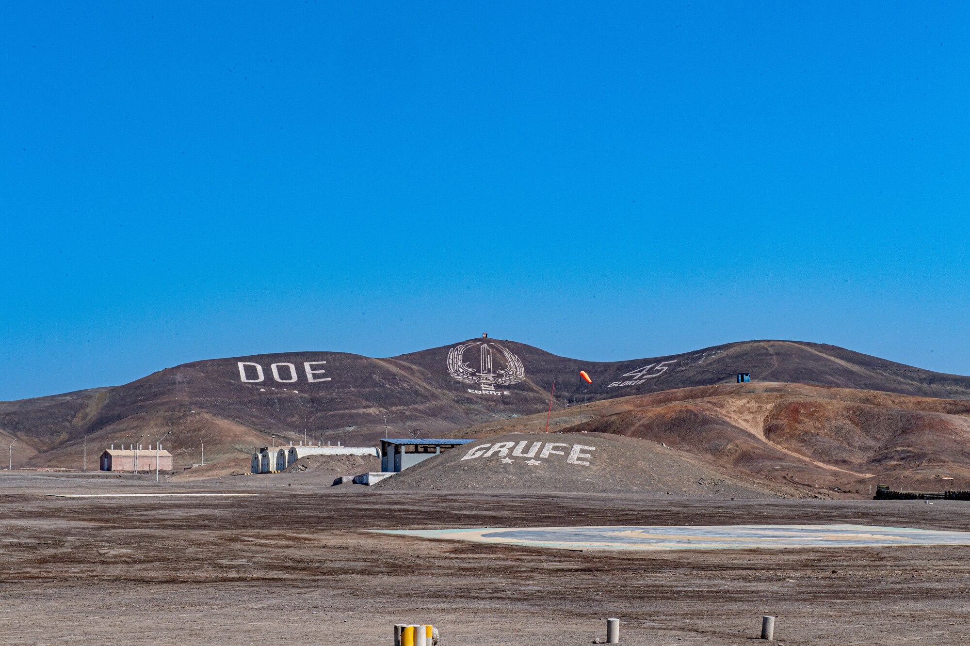 The GRUFE sign sits on the hillside in Lima, Peru, during exercise Resolute Sentinel 2024 on June 3, 2024. RS24 is instrumental in bolstering partner-nation defense capabilities, particularly in combating regional threats and enhancing multinational operations. (U.S. Air Force photo by Senior Airman Courtney Sebastianelli)