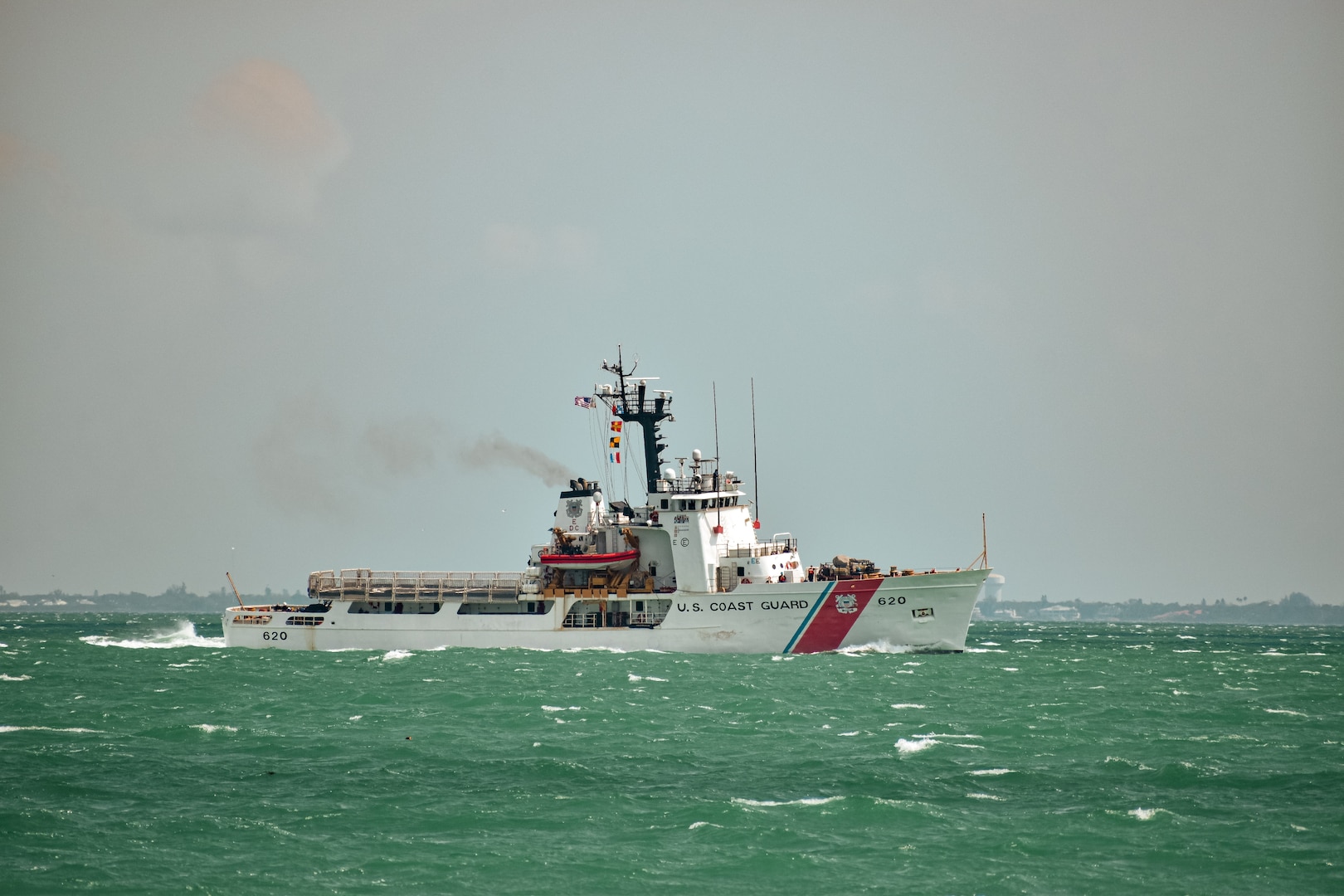 U.S. Coast Guard Cutter Resolute (WMEC 620) transits outbound for sea from homeport, St. Petersburg, Florida, ahead of a migrant interdiction and maritime safety and security patrol in the Caribbean Sea, April 10, 2024. Resolute routinely performs deterrence of illegal maritime migration throughout the Windward Passage, prioritizing the safety of life at sea and protecting the Nation’s southern maritime border. (U.S. Coast Guard photo courtesy of Coast Guard Cutter Resolute)