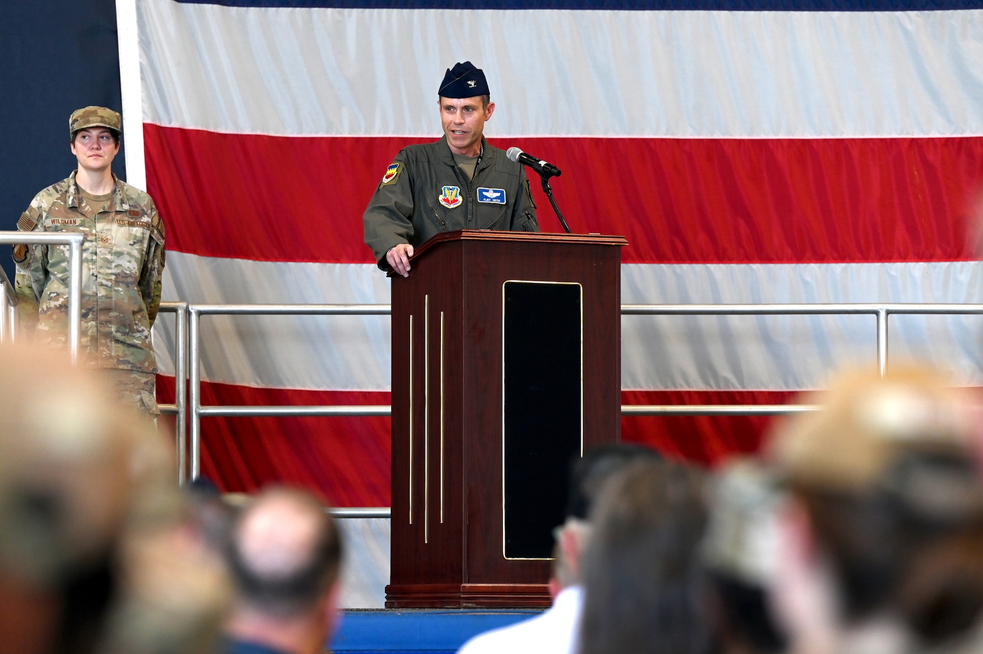 U.S. Air Force Col. Kevin Hicok, incoming 20th Fighter Wing commander, speaks to assembled guests during a change of command ceremony at Shaw Air Force Base, S.C., June 7, 2024. The ceremony allowed members of the 20th FW to witness the transition of leadership, as well as Hicok’s move from deputy commander to commander. (U.S. Air Force photo by Staff Sgt. Kelsey Owen)