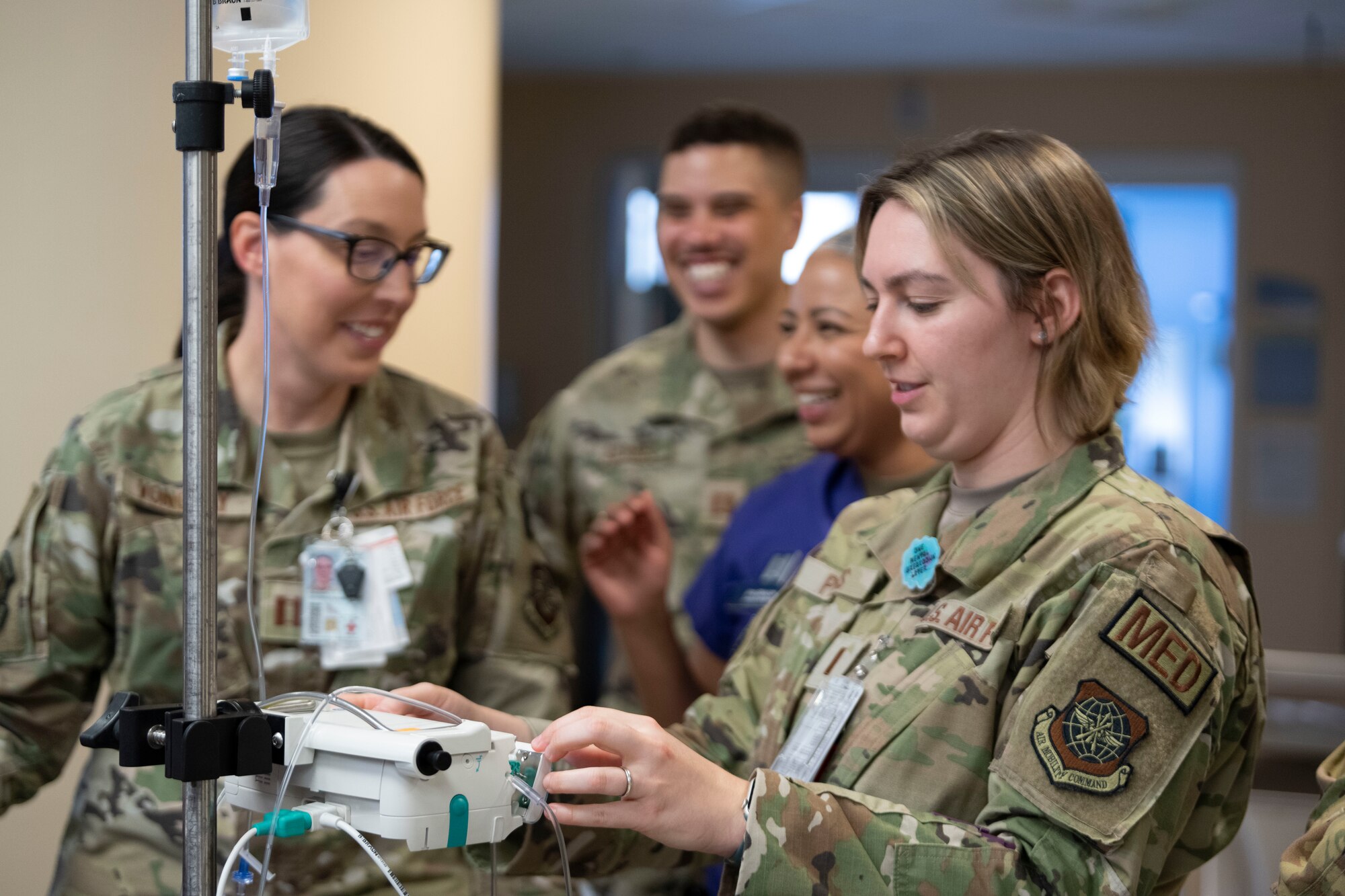 Military medics use IV equipment