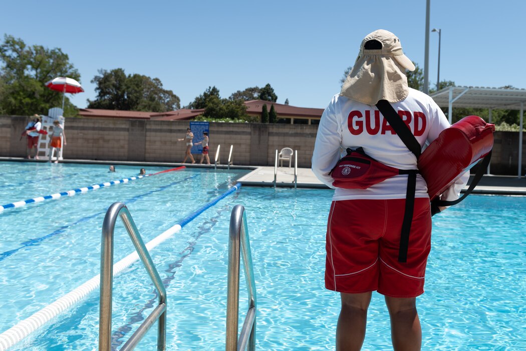 Lifeguard observes the pool