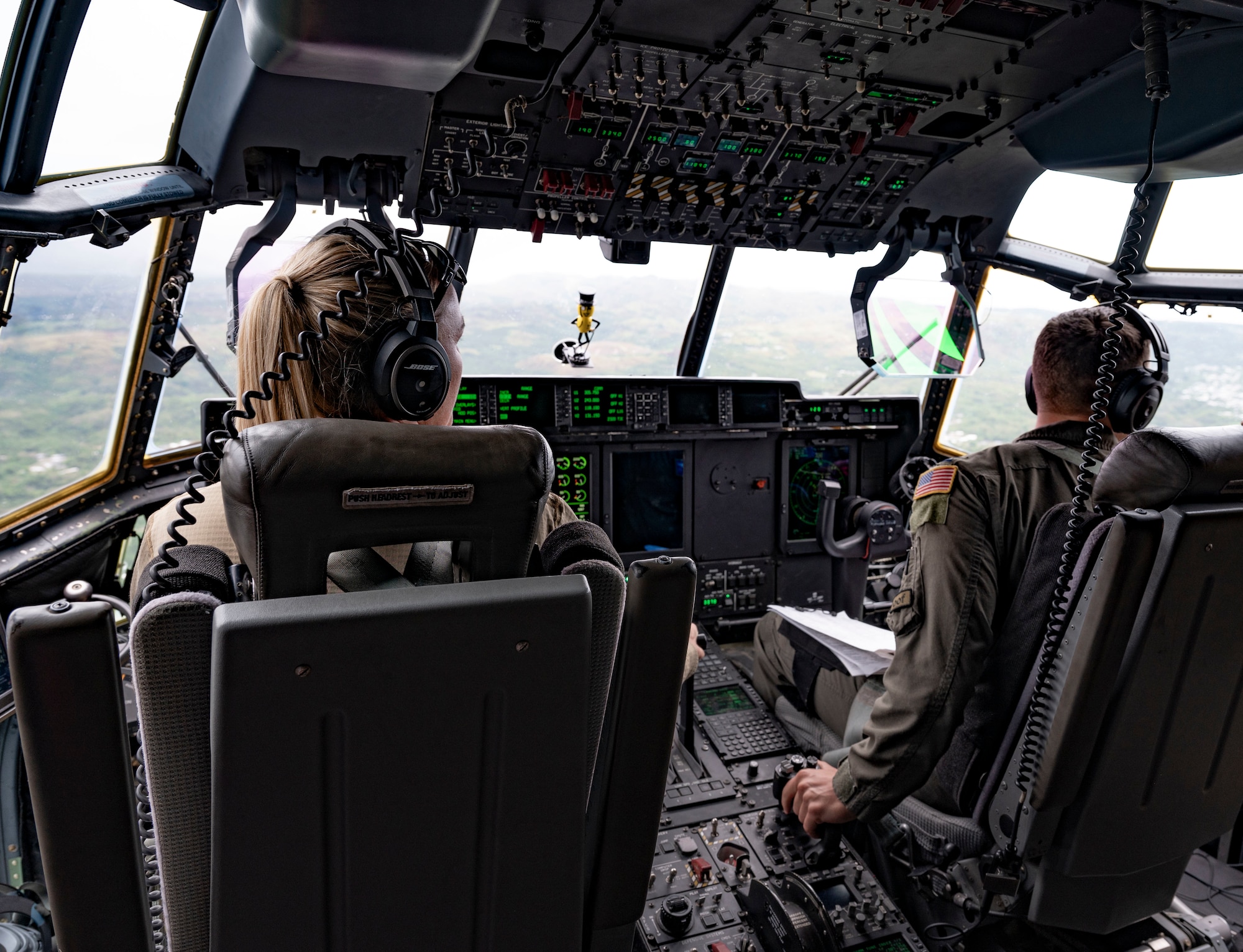 U.S. Air Force Capt. Allison Swift, 39th Airlift Squadron instructor pilot, and Capt. Kevin Acree, 40th Airlift Squadron pilot, begin landing a C-130J Super Hercules during an extended maximum endurance operation, June 5, 2024. MEO capabilities are important to ensure maximum preparedness and strategic use of tactical airlift capabilities, improving interoperability to foster a free and open Indo-Pacific. (U.S. Air Force photo by Airman 1st Class Emma Anderson)