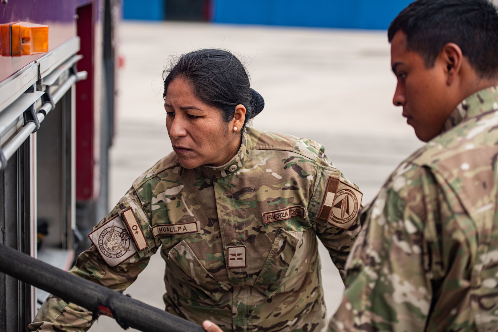 A Peruvian firefighter wraps up a hose during Resolute Sentinel 2024 in Lima, Peru, June 3, 2024. Exercise RS24 is an opportunity for cultural and tactical integration between the U.S. and its allied Latin American nations. (U.S. Air force photo by Airman 1st Class Sir Wyrick)