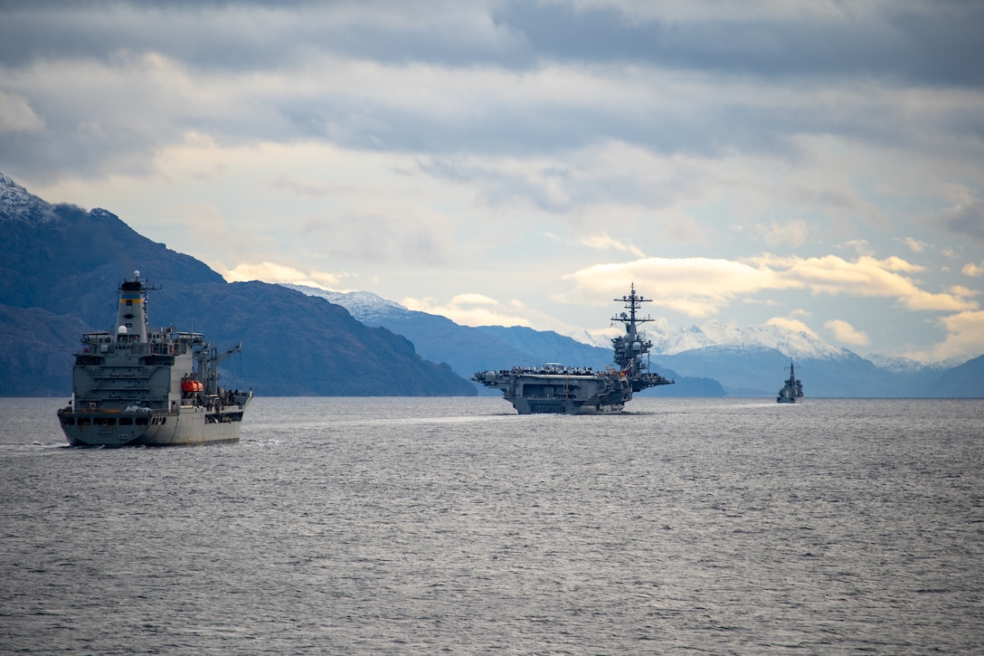 USNS John Lenthall, left, USS George Washington (CVN 73) and a Chilean navy ship transit the Strait of Magellan.