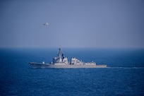 The guided-missile destroyer USS Mason (DDG 87) sails in the Gulf of Aden Nov. 25, 2023. As part of the Dwight D. Eisenhower Carrier Strike Group (IKECSG), the Mason is deployed to the U.S. 5th Fleet area of operations to support maritime security and stability in the Middle East. (U.S. Navy Photo by Mass Communication Specialist 3rd Class Samantha Alaman)