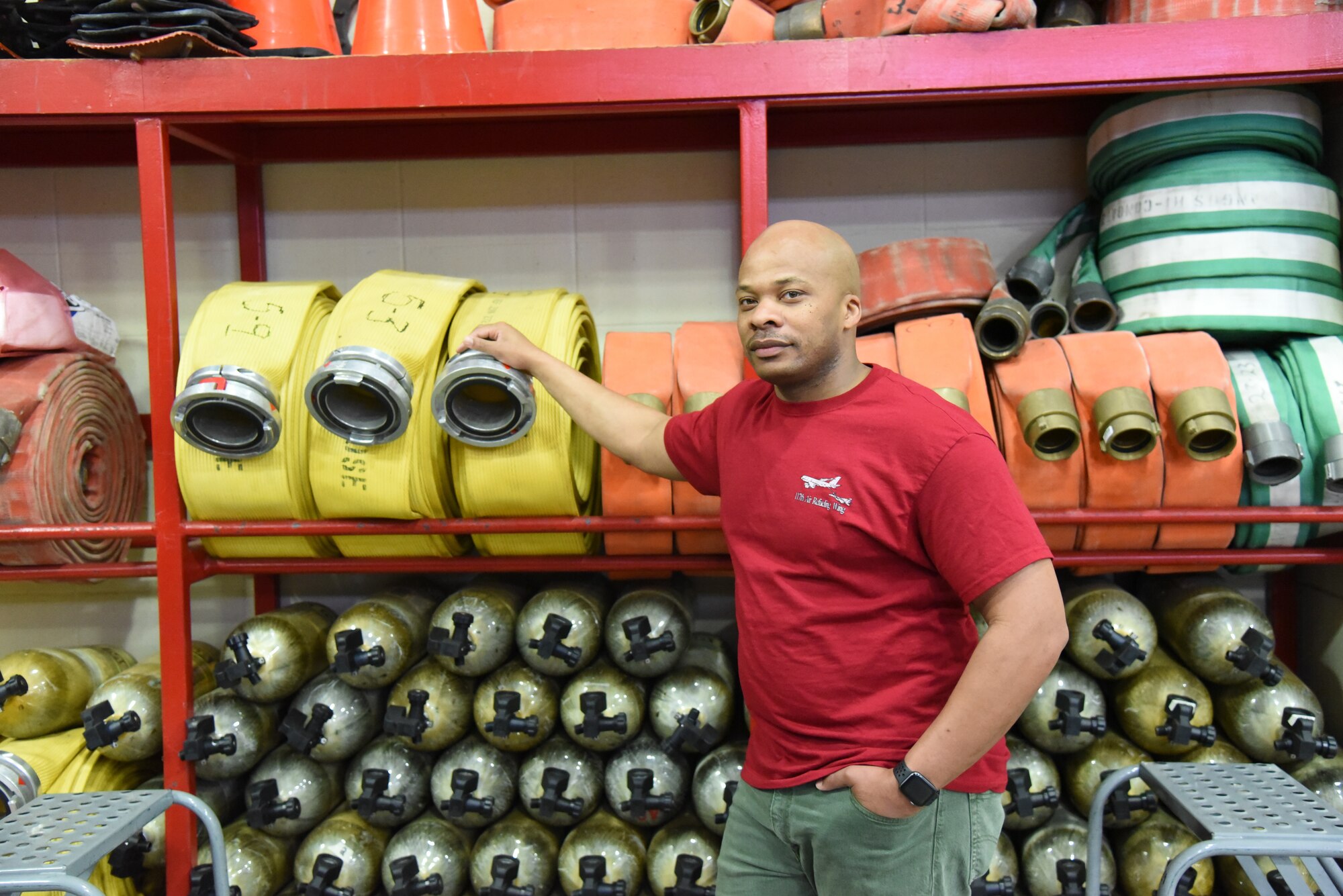 U.S. Air Force Staff Sgt., Eugene DaBon, firefighter, 117th Civil Engineer Squadron, poses for a picture at the fire station at Sumpter Smith Joint National Guard Base, Birmingham, Alabama, Feb. 11, 2024. (U.S. Air National Guard photo by Tech. Sgt. Wesley Jones)