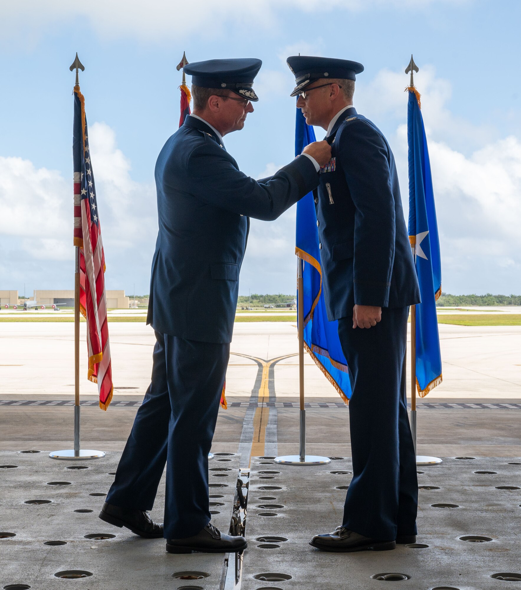 U.S. Air Force Brig. Gen. Thomas Palenske, 36th Wing Commander, pins a decoration on Col. James Hendrickson, 36th Maintenance Group commander, during the 36th Maintenance Group Change of Command at Andersen Air Force Base, Guam, June 5, 2024.  The ceremony marks the passing of responsibility of command. (U.S. Air Force Photo by Airman 1st Class Manasseh Demissie)