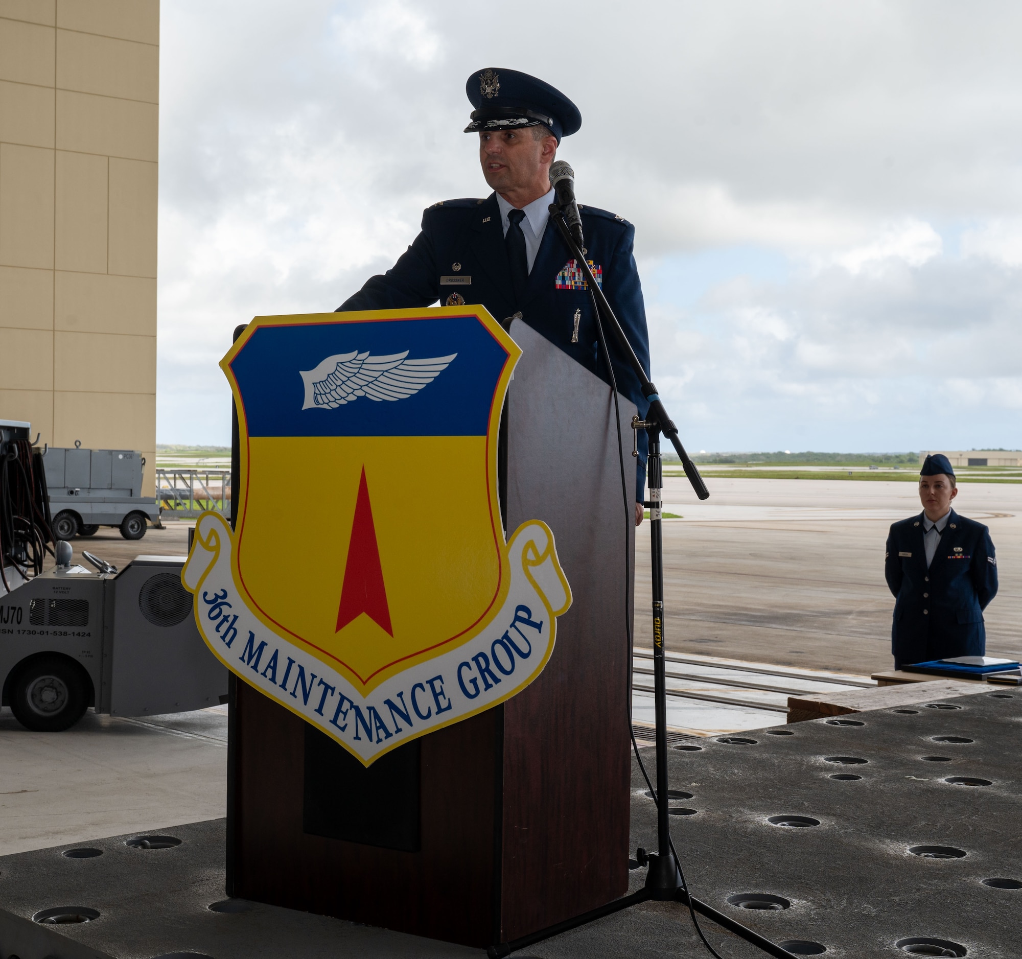 U.S. Air Force Col. Matthew Drossner, 36th Maintenance Group commander, provides his first speech as the newly appointed 36th Maintenance Group commander during the 36th Maintenance Group change of command at Andersen Air Force Base, Guam, June 5, 2024. The ceremony marks the formal passing of responsibility of command. (U.S. Air Force Photo by Airman 1st Class Manasseh Demissie)
