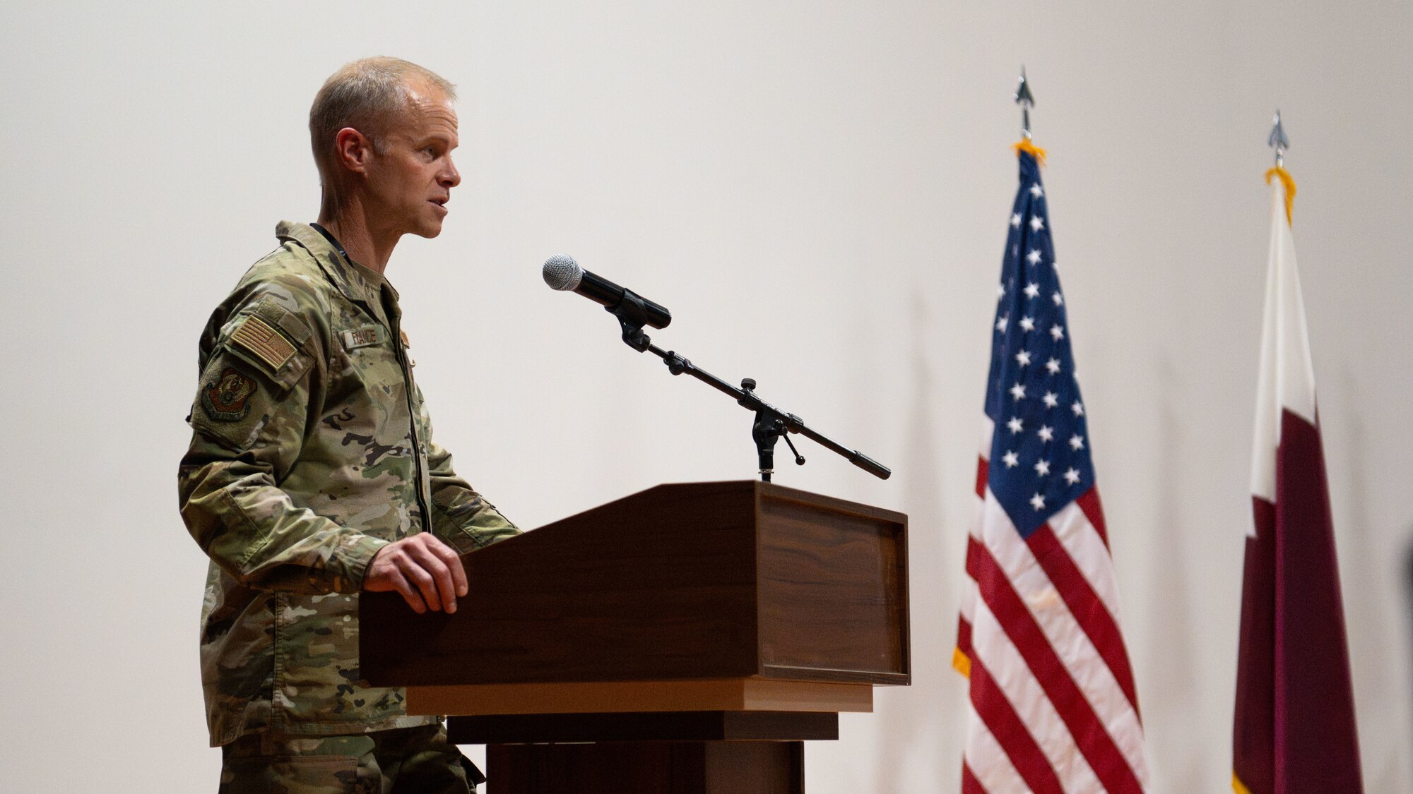 U.S. Air Force Lt. Gen. Derek France, U.S. Air Forces Central commander, delivers remarks during the 379th Air Expeditionary Wing change of command ceremony, June 10, 2024. The ceremony marked the transfer of responsibilities from Brig. Gen. Douglas Jackson and Brig. Gen. Richard Dickens. (U.S. Air Force photo)