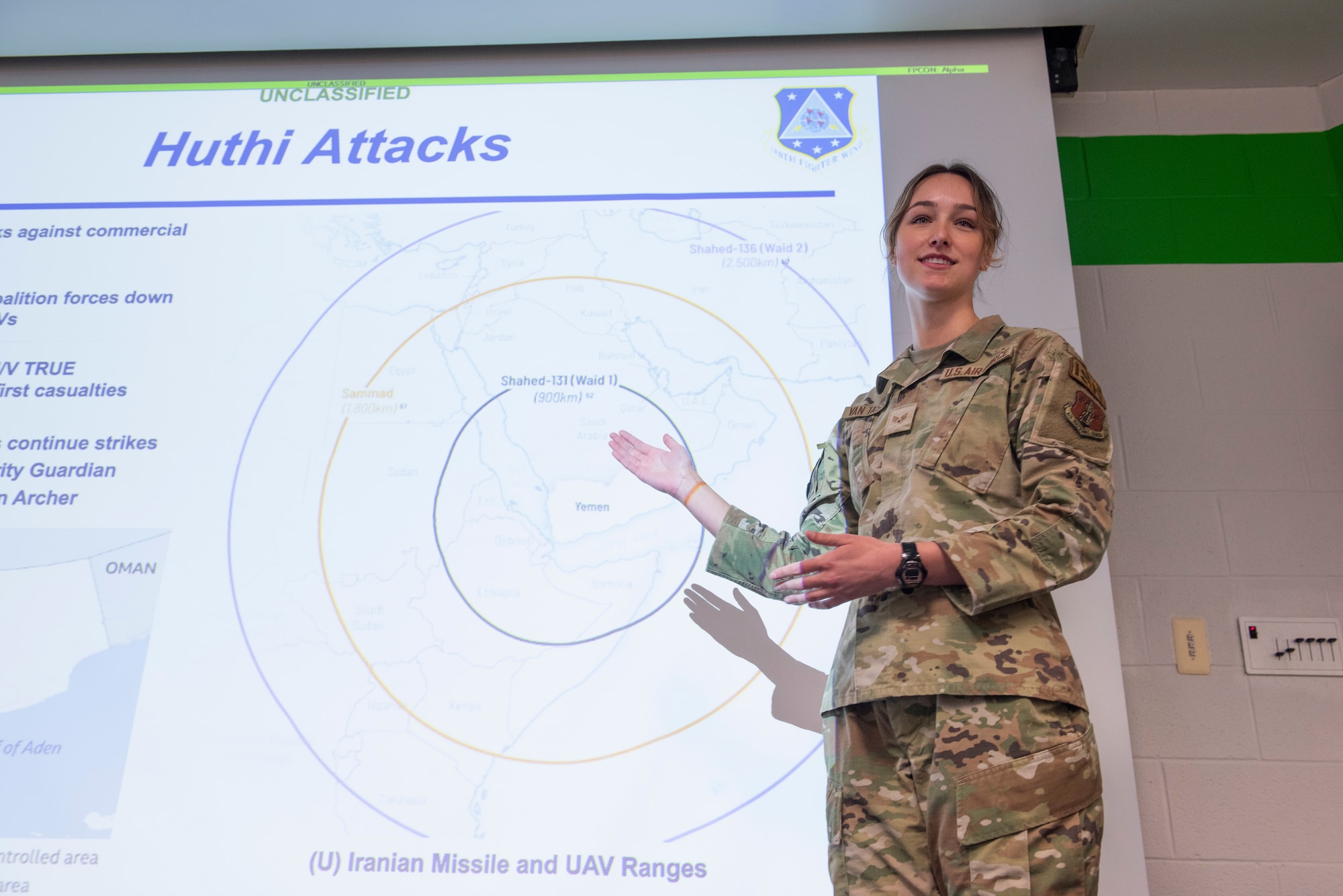 Woman gives presentation.