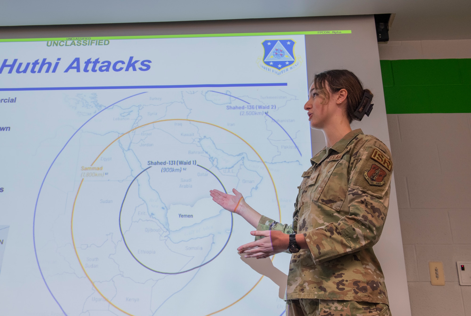 Woman gives presentation.