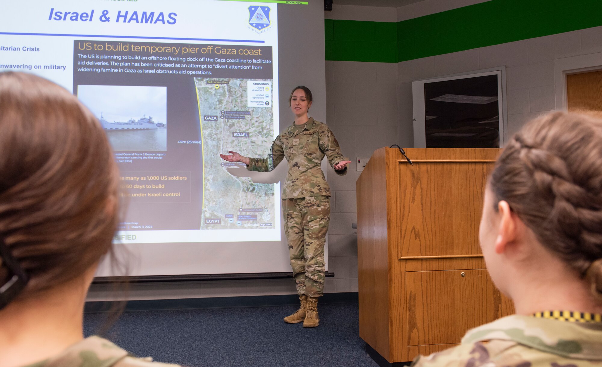 Woman gives presentation.