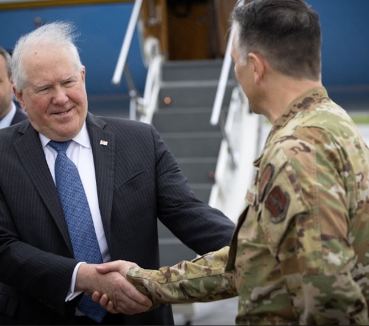 Secretary of the Air Force Frank Kendall is greeted by Col. Byron Newell, 101st Air Refueling Wing commander, at Bangor Air National Guard Base, Maine, June 7, 2024.