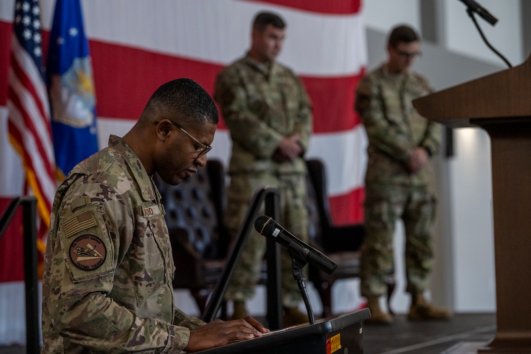 U.S. Air Force Capt. Ange Kouadio, 23rd Wing chaplain, gives the invocation during a Bronze Star presentation at Moody Air Force Base, Georgia, May 23, 2024. The Bronze Star medal is a United States military individual decoration and is the fourth highest award for bravery, heroism or meritorious service. (U.S. Air Force photo by Senior Airman Deanna Muir)