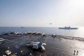 USS Dwight D. Eisenhower (CVN 69) transits the Red Sea with Italian Navy ships.