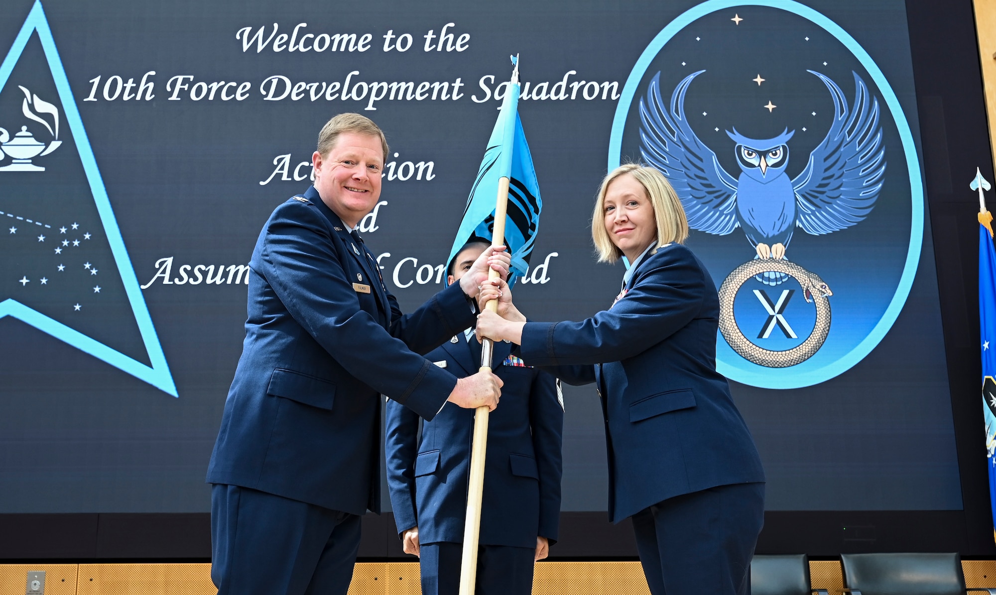 U.S. Space Force Lt. Col. Amber Dawson assumes command of the 10th Force Development Squadron during an activation and assumption of command ceremony at the U.S. Air Force Academy, in Colorado Springs, Colo., June 6, 2024. The 10th FDS is one of four units that constitute Delta 10, and focuses on providing warfighters with the necessary doctrine to conduct the “fight tonight.” The 10th FDS not only produces Space Force doctrine, but it also codifies service tactics and plays a pivotal role in Space Force concept development to posture Space Force forces and designated joint and allied partners to prevail in a Contested, Degraded, Operationally Limited (CDO), all-domain environment. (U.S. Air Force photo by Capt. Charles Rivezzo)