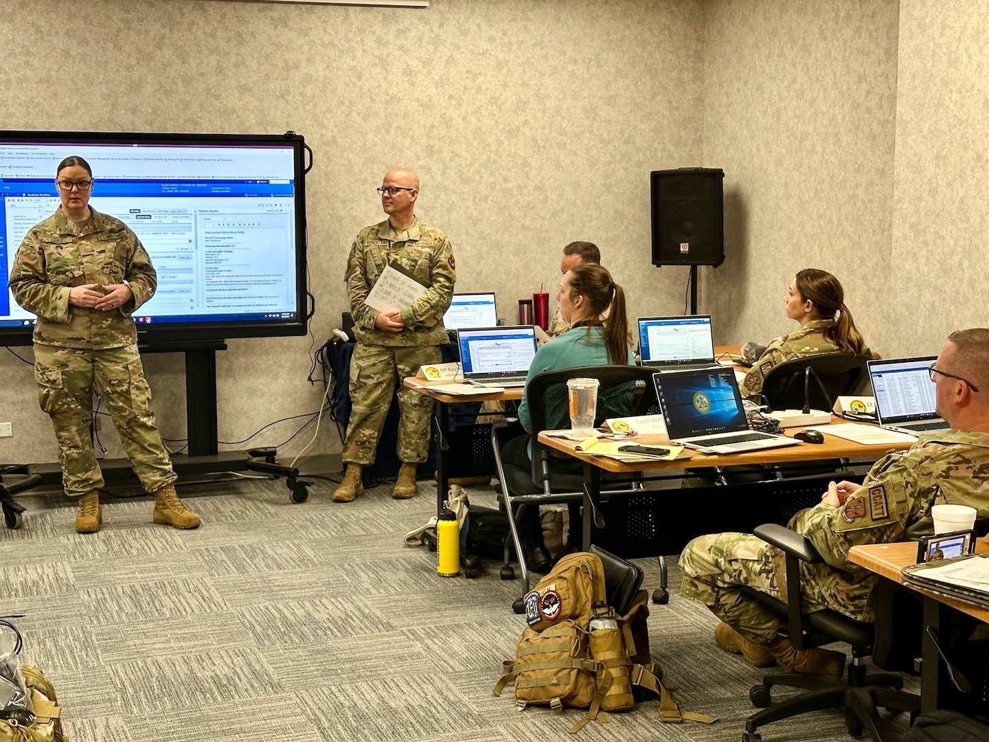 Air Force Master Sgt. Melissa Laboy, USMEPCOM medical accessions NCOIC, provides training to Air Force Reserve Component Airmen and Army National Guard Soldiers who volunteered to serve in the USMEPCOM Prescreen Support Coordination Center (PSCC). The PSCC allows providers to review military applicant medical prescreens virtually, helping to decrease the amount of time an applicant spends in their MEPS and shortening contact-to-contract time.