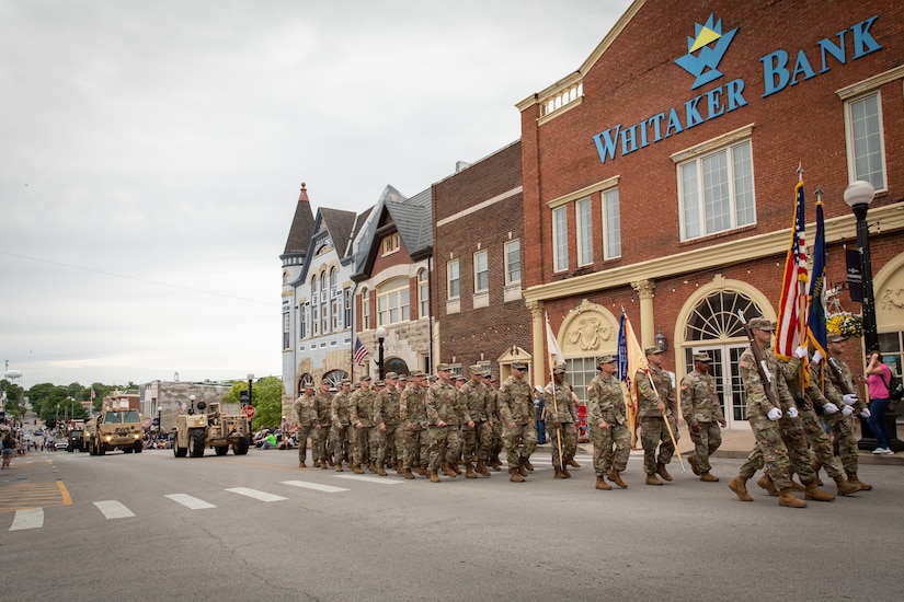 Soldiers of the 103rd Brigade Support Battalion march in the 250th anniversary of the settlement of Harrodsburg parade in Harrodsburg, Kentucky on June 8, 2024. The 103rd BSB supported the 250th anniversary of the settlement of Harrodsburg by participating in posting the colors, marching in the parade, and providing a static display of military vehicles. (U.S. Army National Guard photo by Sgt. 1st Class Andrew Dickson)