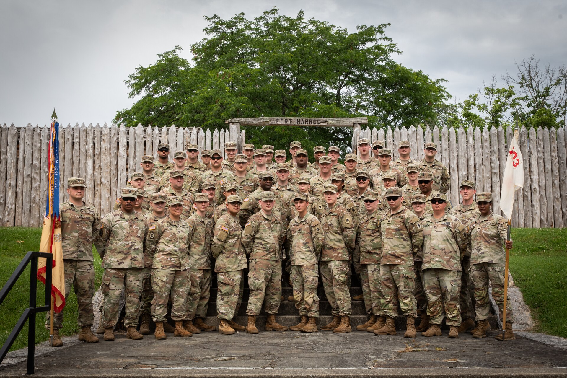 Soldiers with the 103rd Brigade Support Battalion, 138th Field Artillery Brigade, pose for a photo at the Old Fort Harrod State Park in Harrodsburg, Kentucky on June 8, 2024. The 103rd BSB supported the 250th anniversary of the settlement of Harrodsburg by participating in posting the colors, marching in the parade, and providing a static display of military vehicles. (U.S. Army National Guard photo by Sgt. 1st Class Andrew Dickson)