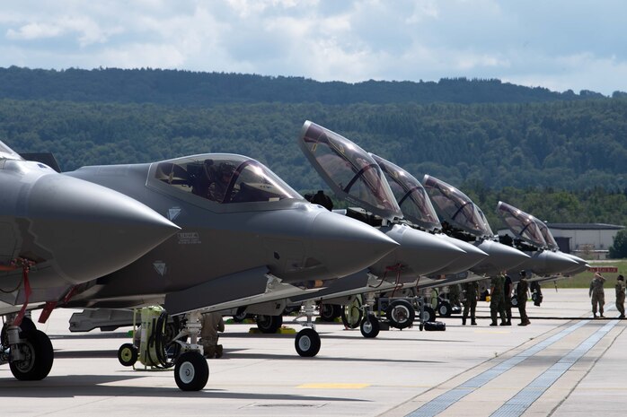 Eight U.S. Air Force F-35A Lightning IIs receive maintenance during Ramstein 1v1 at Ramstein Air Base, Germany, June 6, 2024. Ramstein 1v1, U.S. Air Forces in Europe - Air Forces Africa's first-ever basic fighter maneuvers exercise at Ramstein AB, included 37 fighter aircraft from nine NATO countries such as F-35A Lightning IIs; F-16 Fighting Falcons; Eurofighter Typhoons; Dassault Rafale Cs; F/A-18 Hornets and a Douglas A-4 Skyhawk. (U.S. Air Force photo by Airman 1st Class Trevor Calvert)