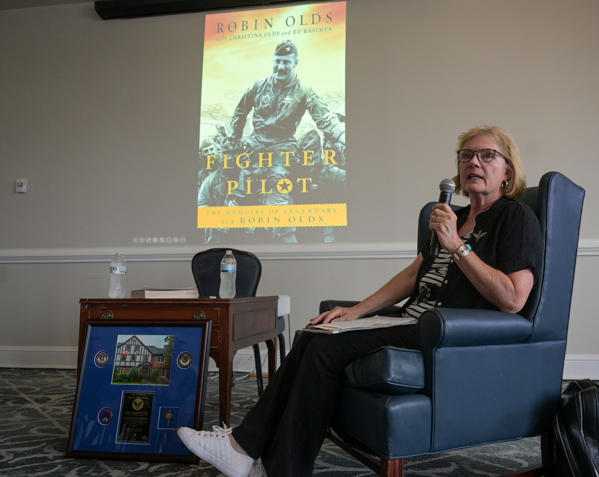Author speaking to audience.