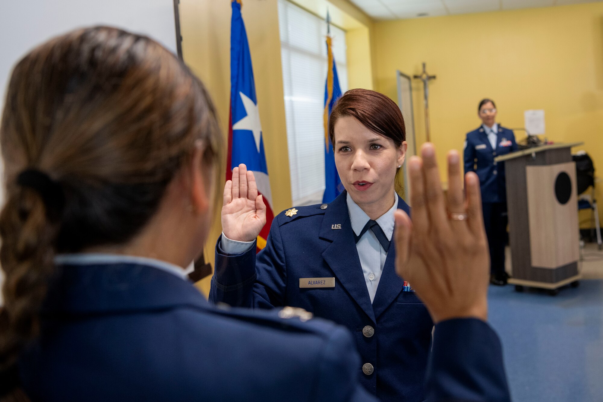U.S. Air Force Col. Leah Botona Boling, the director of the Air National Guard Chaplain Corps, administers the Oath of Office to Maj. Iraida M. Alvarez Carrasquillo, the 156th Wing chaplain, Puerto Rico Air National Guard, as part of her promotion to Major during a ceremony at Muñiz Air National Guard Base, Carolina, Puerto Rico, June 1, 2024. During the ceremony, Alvarez received the Samuel Stone Award, recognizing her as the outstanding Air National Guard Chaplain of the Year. (U.S. Air National Guard photo by Airman 1st Class Marrissa L. Rodriguez)