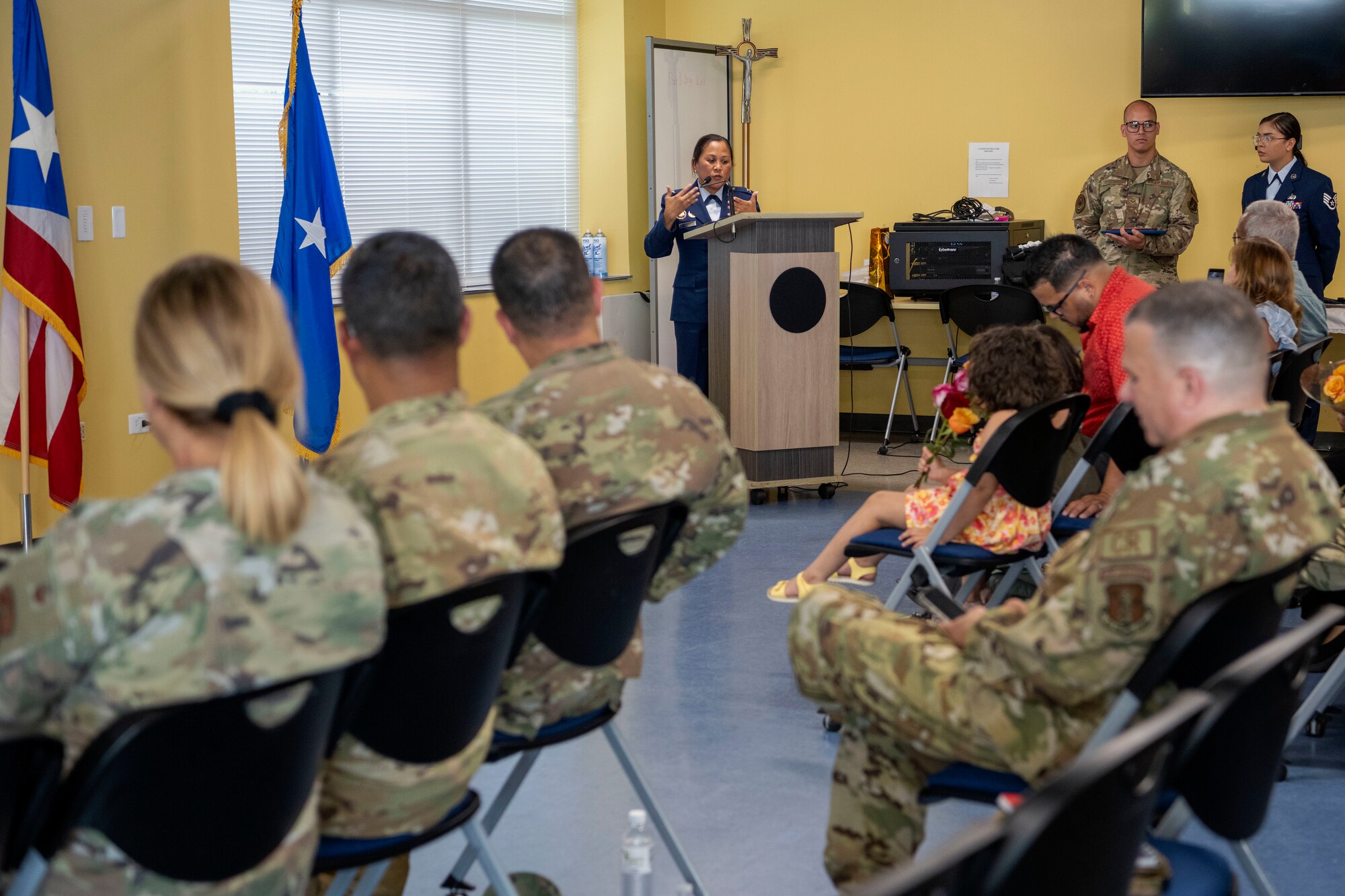 U.S. Air Force Col. Leah Botona Boling, the director of the Air National Guard Chaplain Corps, addresses the Airmen in attendance during a ceremony for Maj. Iraida M. Alvarez Carrasquillo, the 156th Wing chaplain, Puerto Rico Air National Guard, at Muñiz Air National Guard Base, Carolina, Puerto Rico, June 1, 2024. During the ceremony, Alvarez received the Samuel Stone Award, recognizing her as the outstanding Air National Guard Chaplain of the Year. (U.S. Air National Guard photo by Airman 1st Class Marrissa L. Rodriguez)