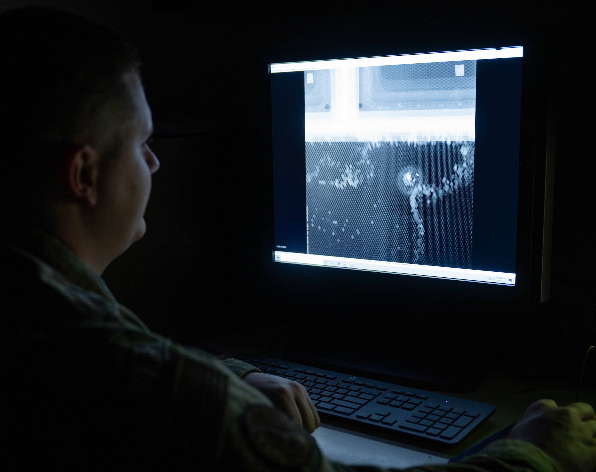 U.S. Air Force Airman 1st Class Omar Murphy, 5th Maintenance Squadron non-destructive inspection (NDI) apprentice, prepares to conduct an oil analysis at Minot Air Force Base, North Dakota, June 6, 2024. NDI technicians are responsible for identifying possible defects in systems and equipment before anything can become a dangerous problem. (U.S. Air Force photo by Airman 1st Class Luis Gomez)